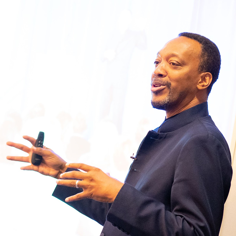 A man is giving a presentation. A man is giving a presentation.